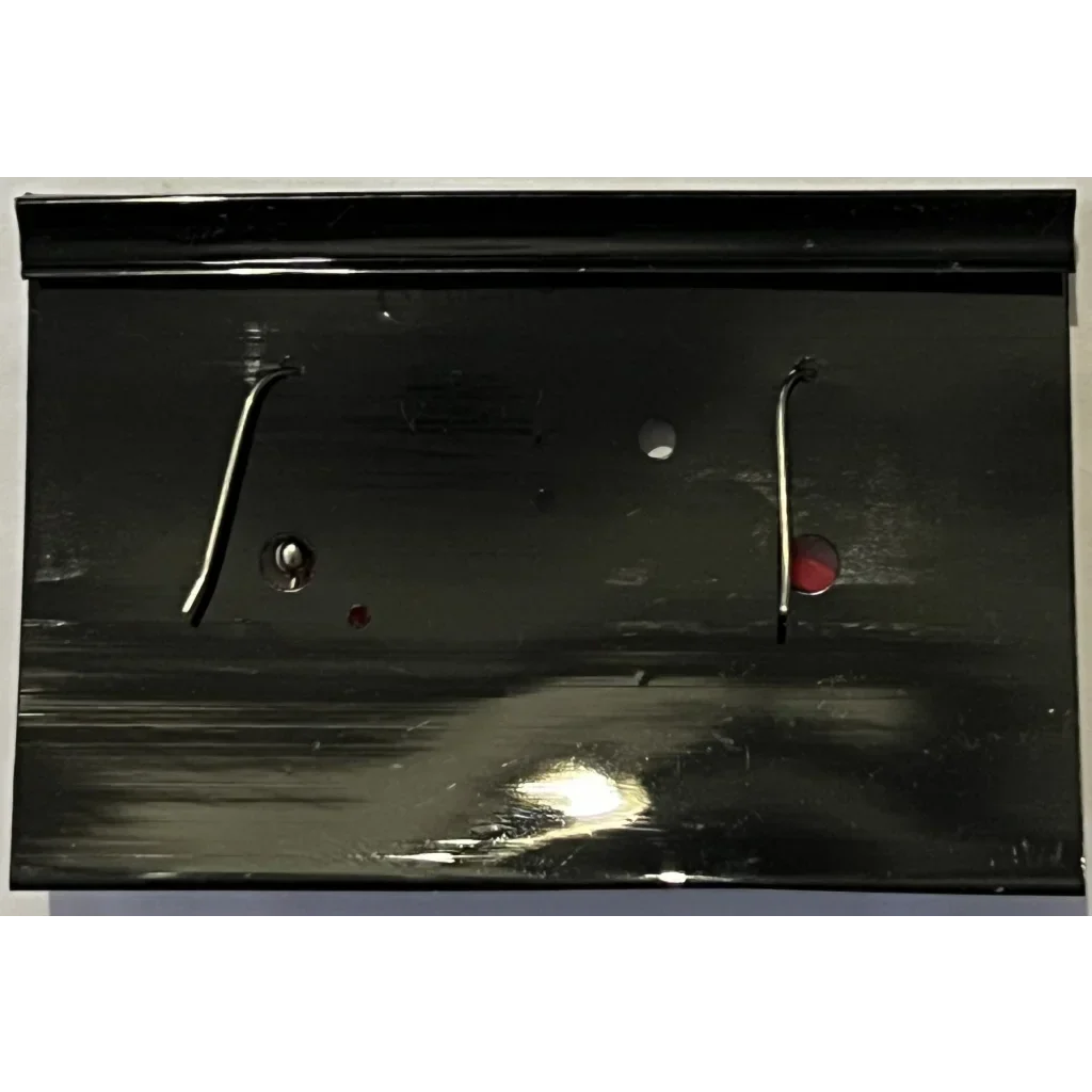 Dark glossy car door panel reflecting light, perfect for showing off Boston Tour Block Earrings