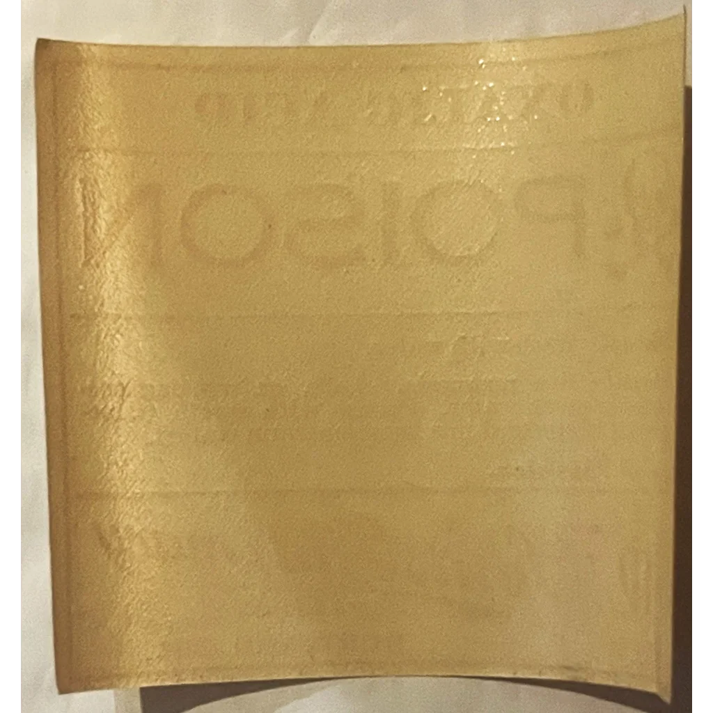 Yellow soap bar with embossed lettering from the 1920s Oxalic Acid label