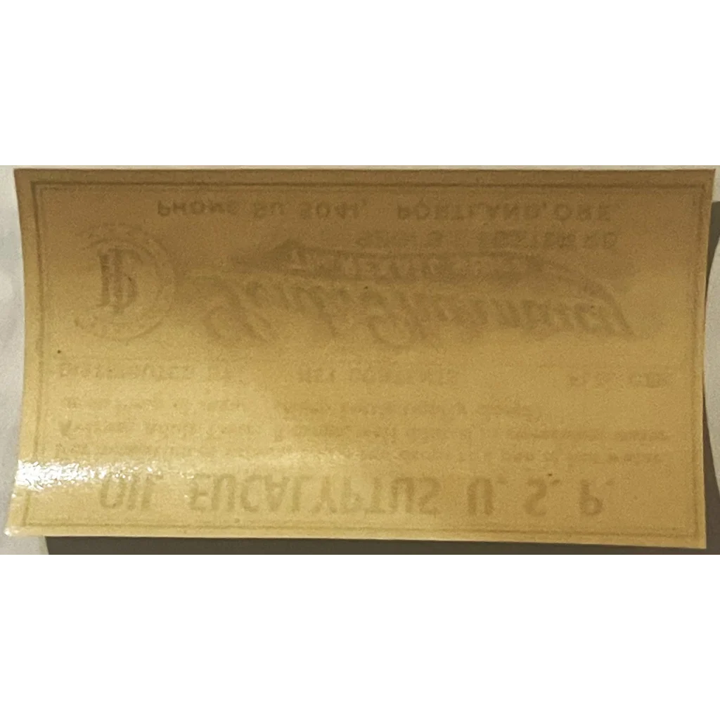 Rubber stamp with reversed text on a Rare Vintage 1930s Oil Eucalyptus Label