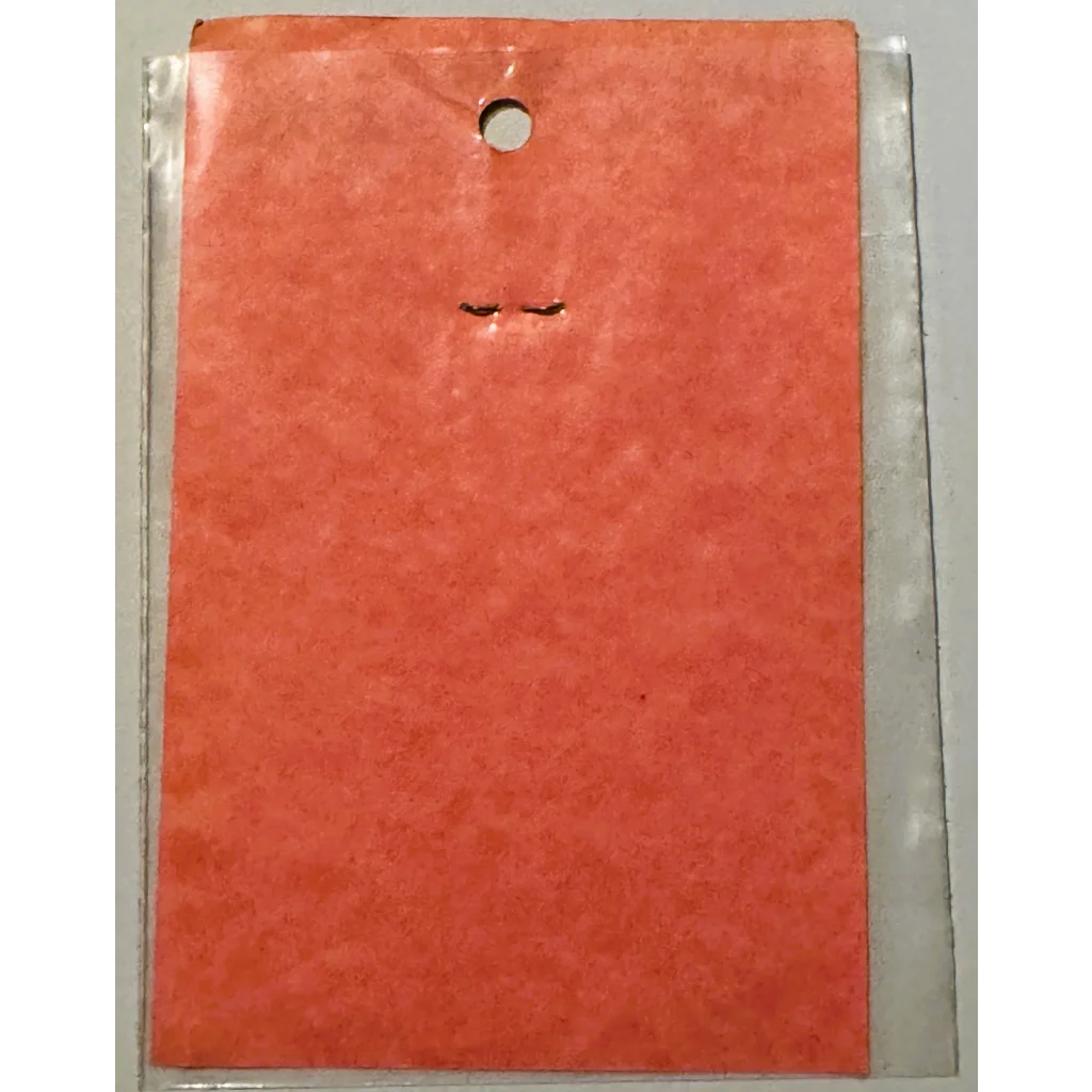Orange paper card in plastic sleeve from rare vintage 1960s dentistry emblem sticker collection
