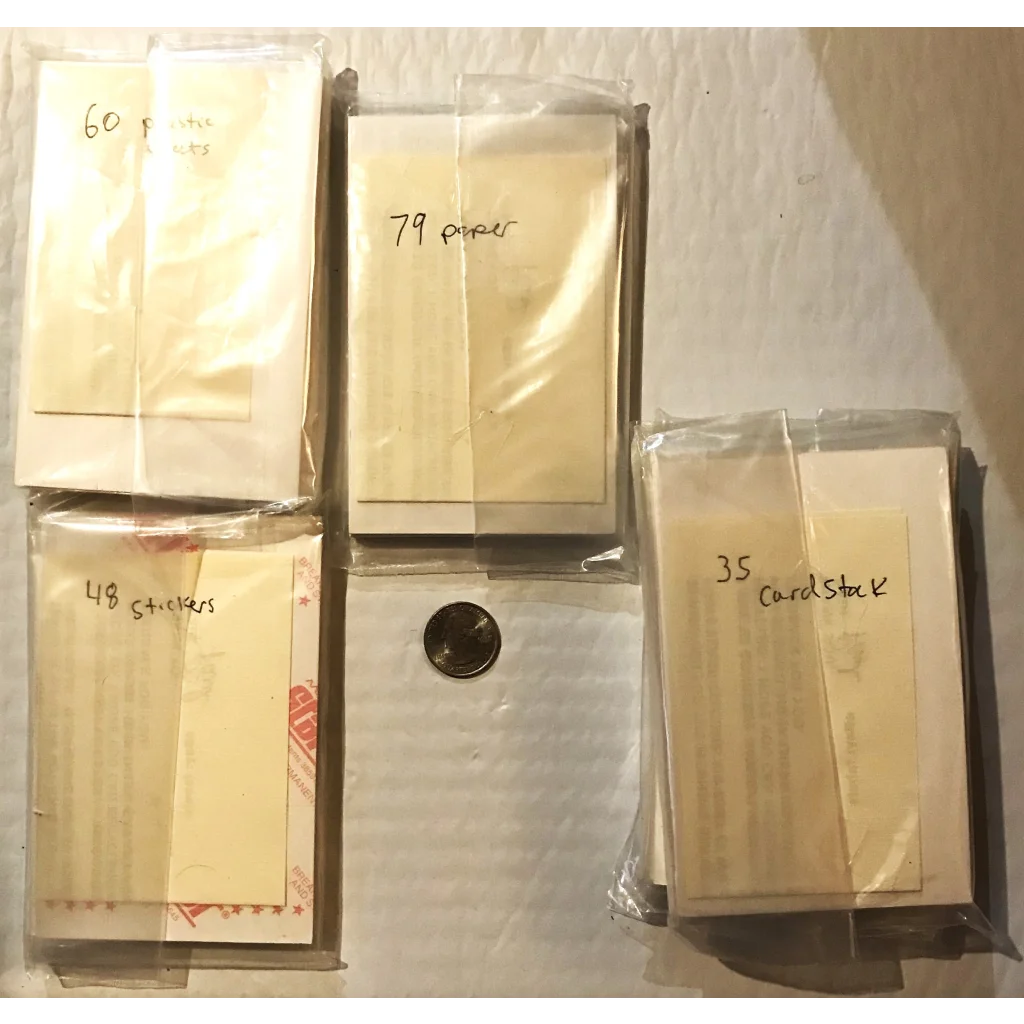 Stacks of envelopes labeled with numbers showcasing the Amelia Earhart Coke ad