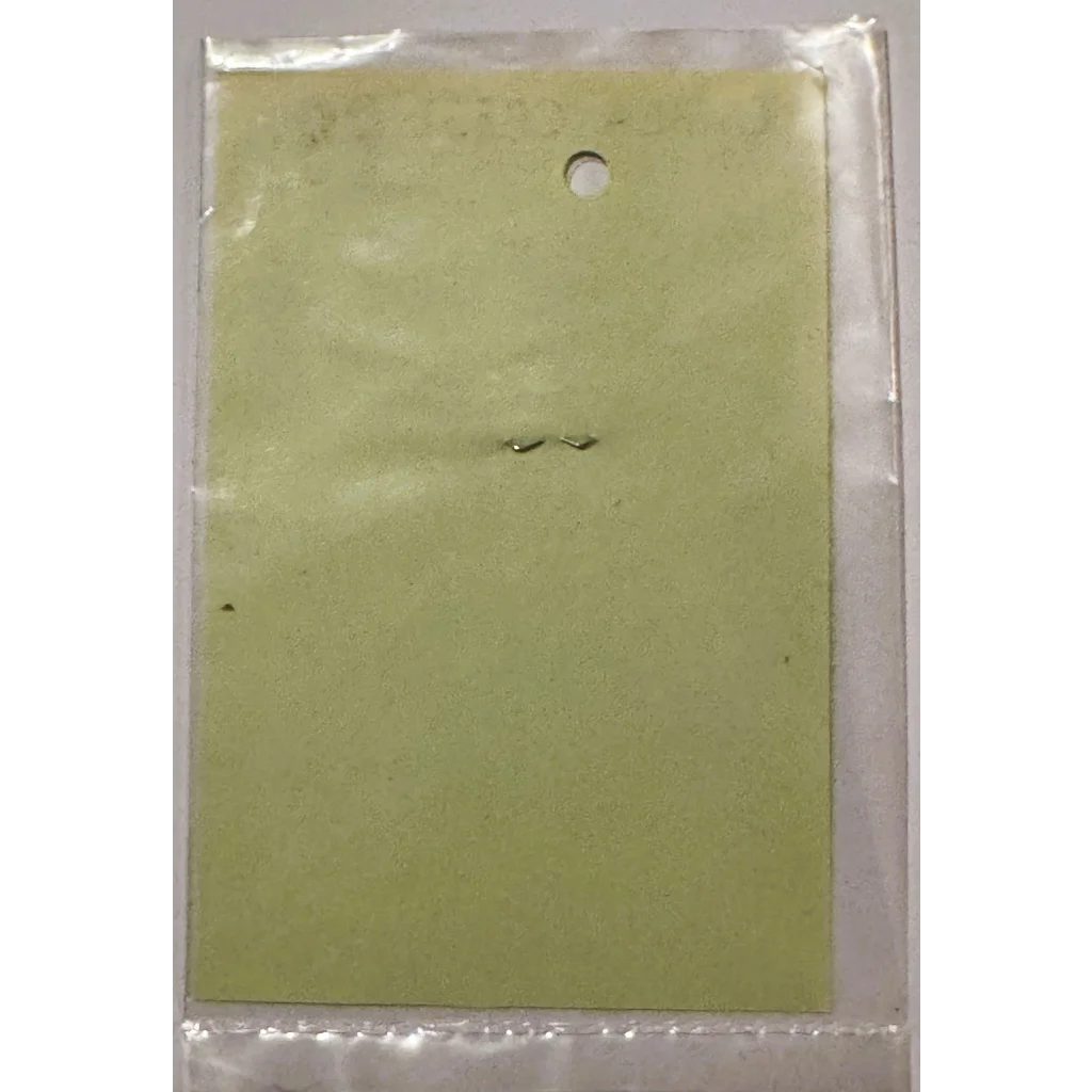 Green card in plastic packaging for rare vintage 1960s Embla Crest Fire Department sticker