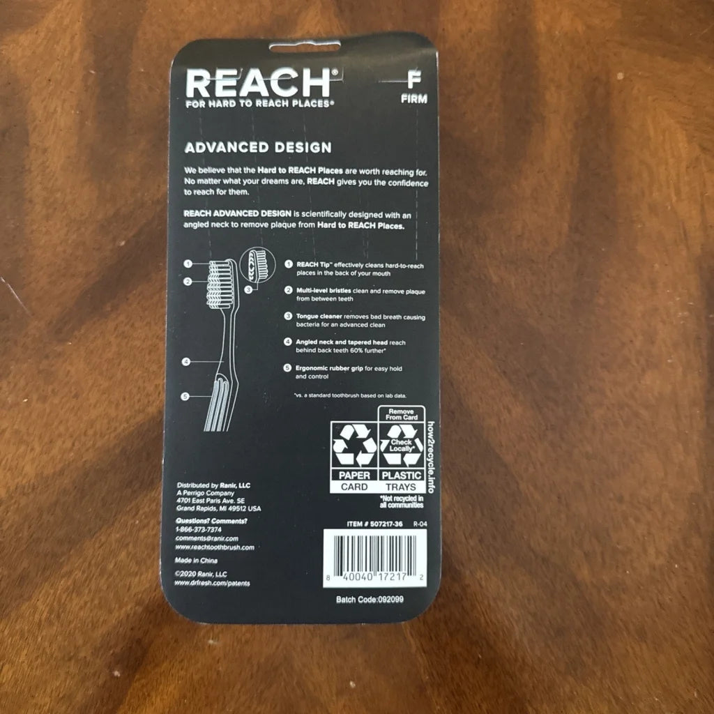 REACH Advanced Design Adult Toothbrush Firm 7 Count black plastic packaging