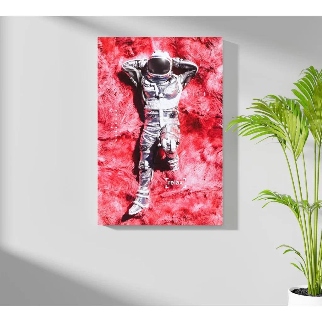 Sleek silver astronaut relaxing on red texture in Insigne aluminum print