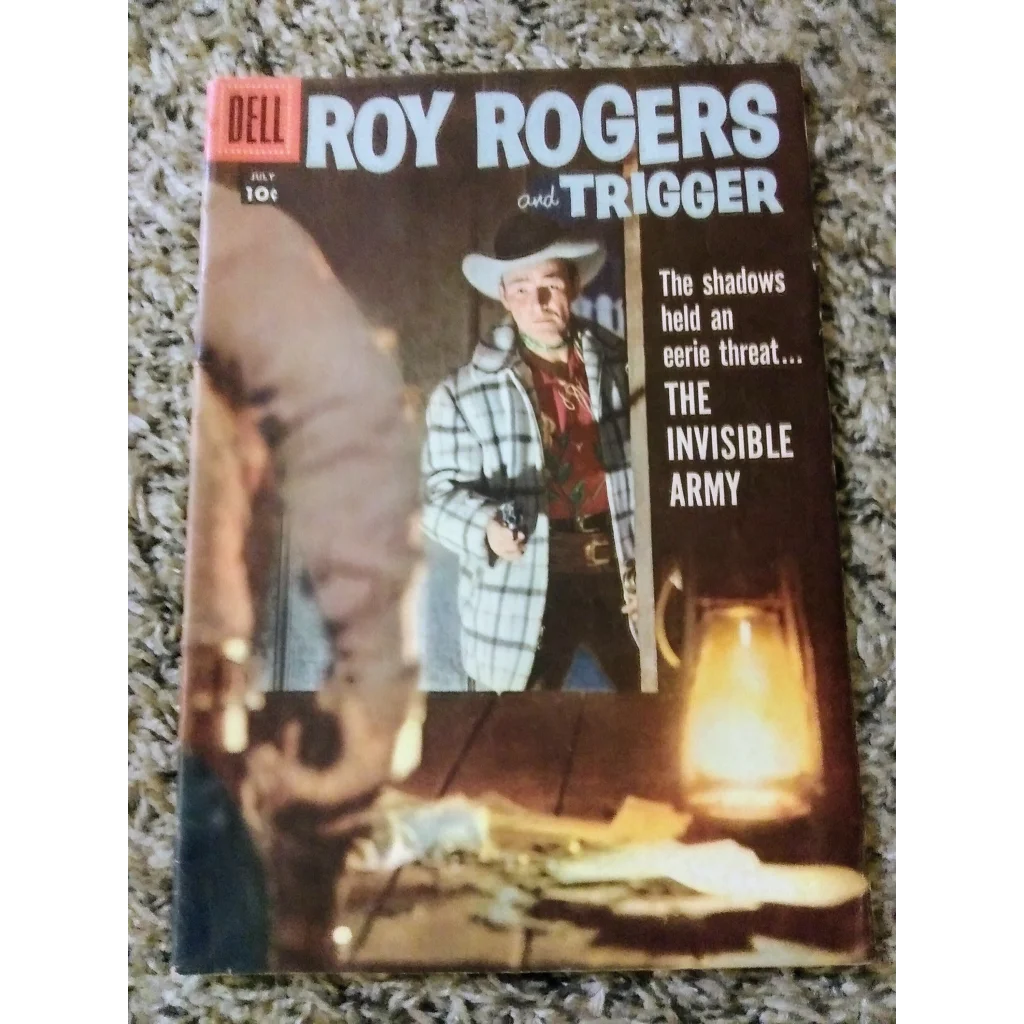1950s Roy Rogers Dell Comics cover: cowboy in plaid shirt and hat with gun