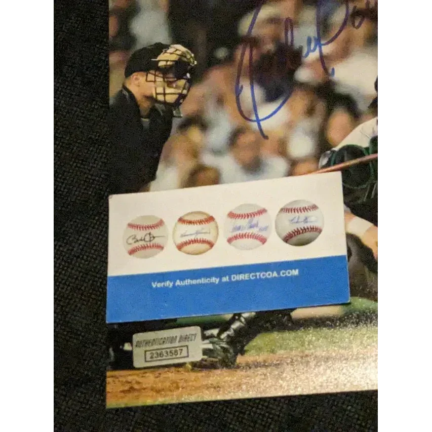 Autographed 8x10 photo of Ruben Sierra with authenticity verification and baseball memorabilia
