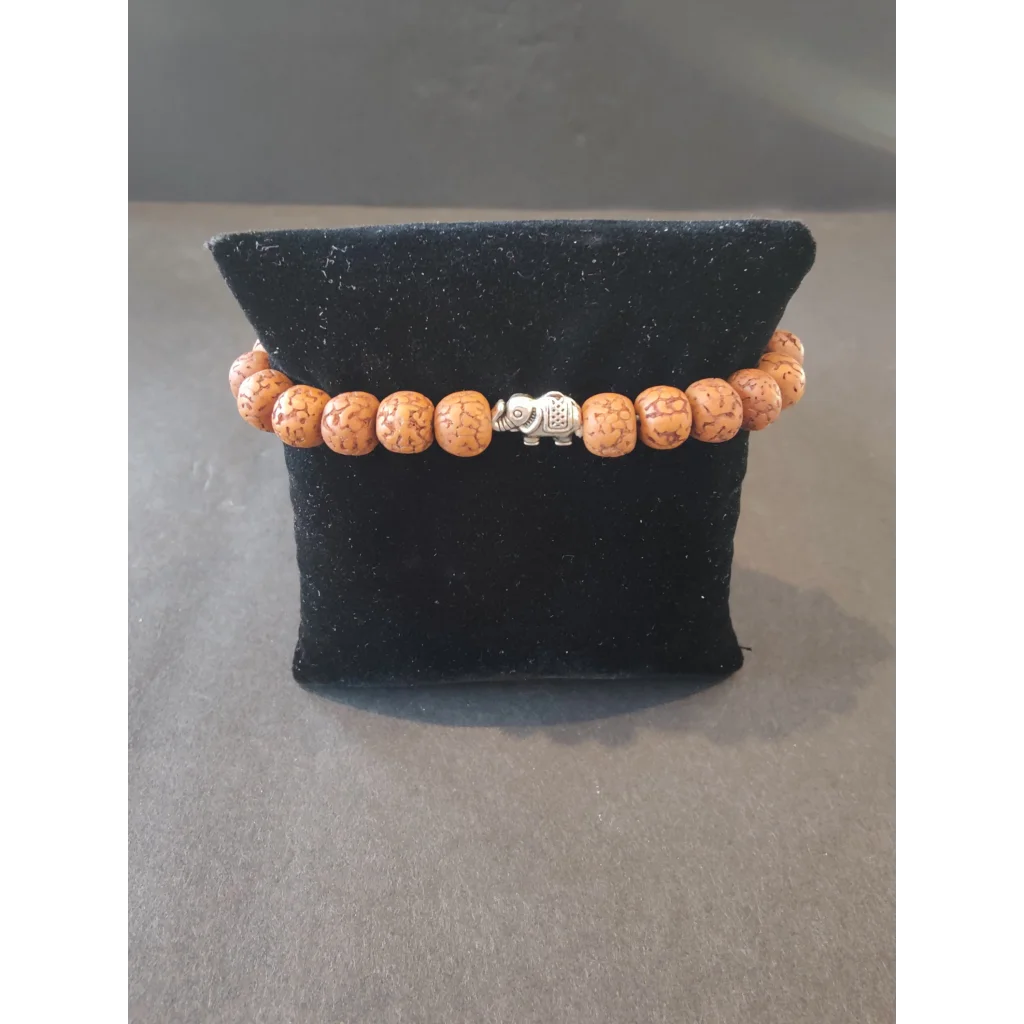 Rudraksha seed beaded bracelet with silver elephant charm