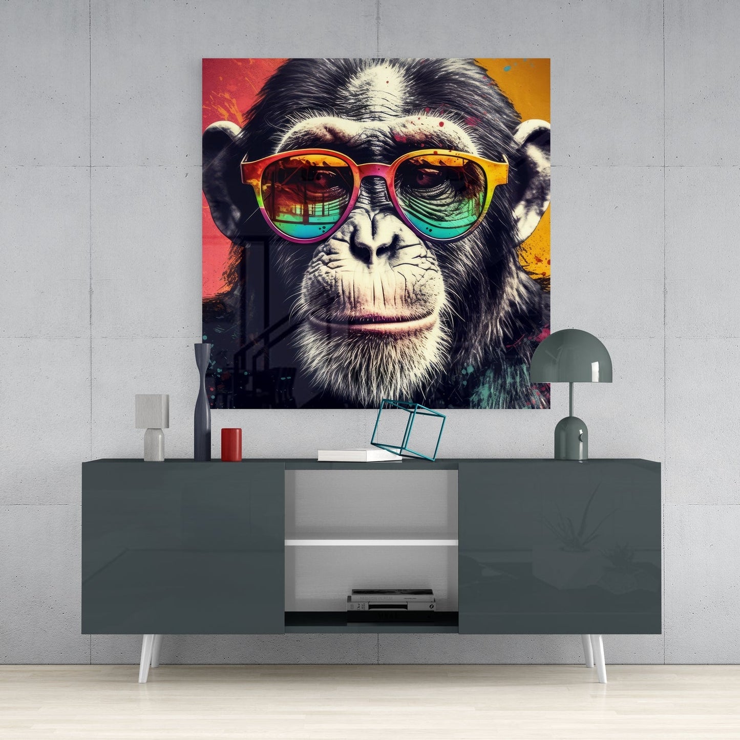 Colorful pop art canvas of a chimpanzee wearing rainbow-gradient sunglasses displayed above a gray media console.