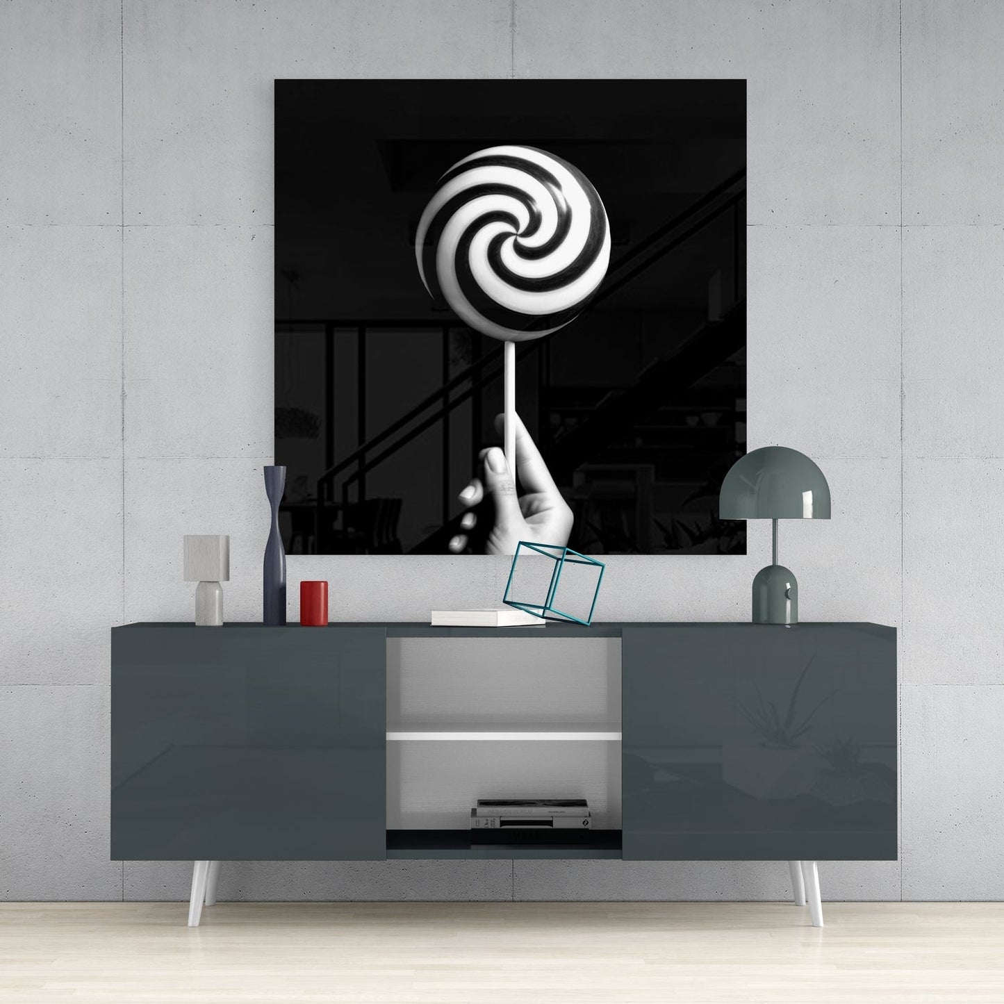 Hand Holding Spiral Lollipop Glass Wall Art