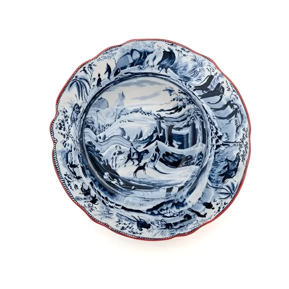 Blue and white ceramic soup plate with ruffled red rim from Seletti Classic Arabian set