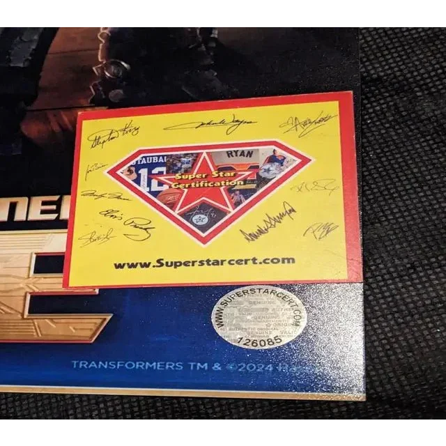 Signed 8x10 Transformers One Movie Poster with Super Star Certificate showing a yellow certificate card