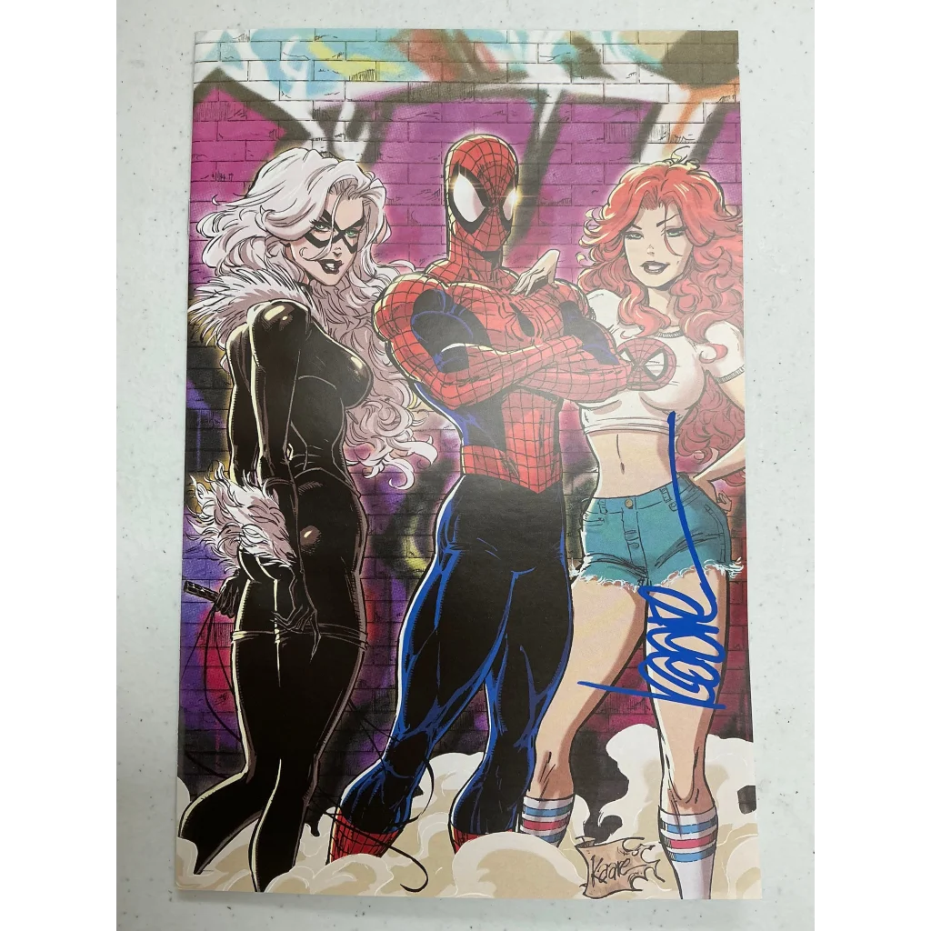 Kaare Andrews signed Spider-Man comic with Black Cat and Mary Jane art print