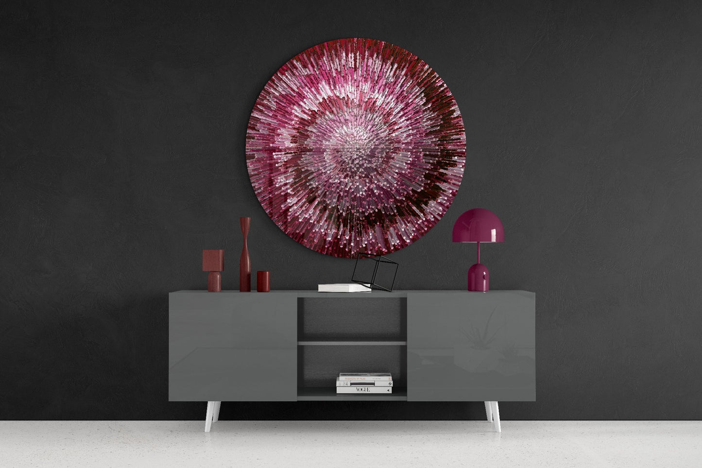 Ruby Helix Glass Wall Art displayed above gray sideboard with burgundy decorative objects and lamp in modern interior setting.