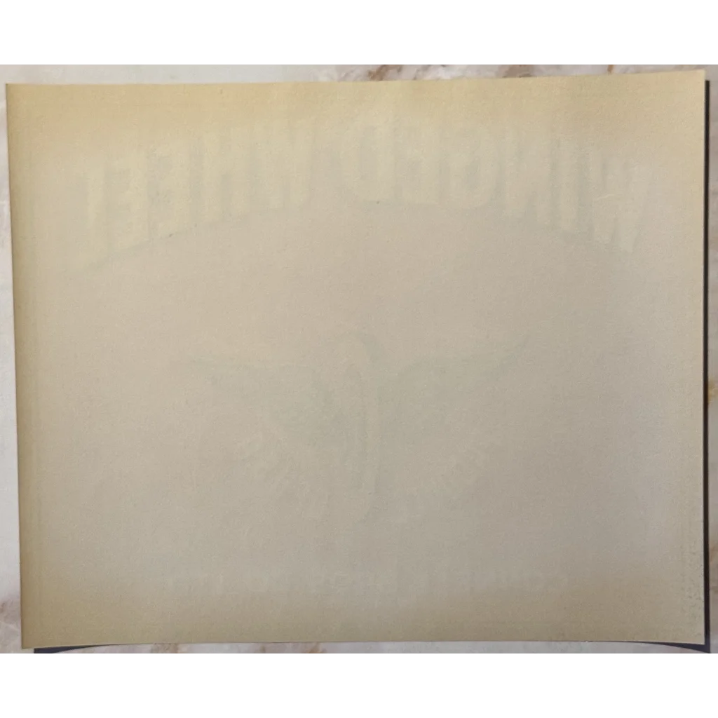 Blank off-white paper for vintage 1940s winged wheel crate labels display