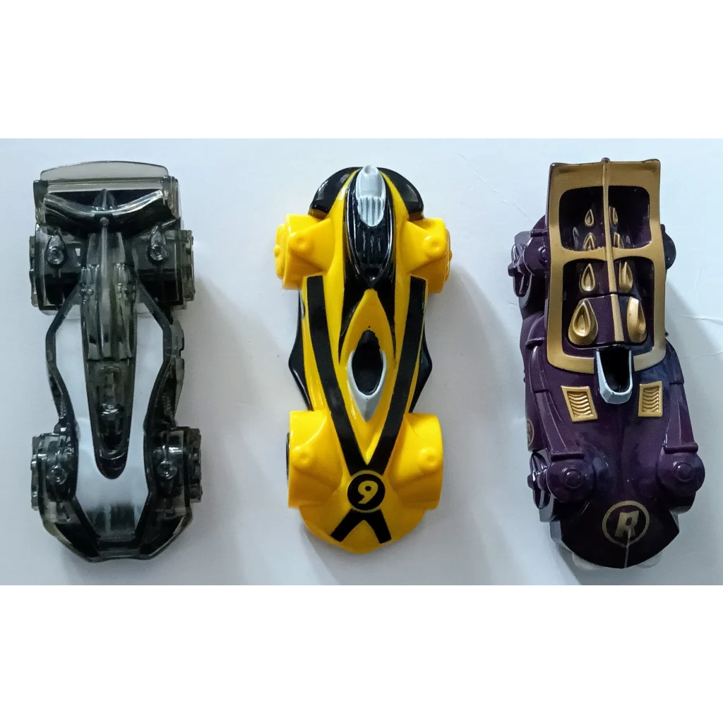 Yellow black Speed Racer happy meal toy pull back race car with gold accents