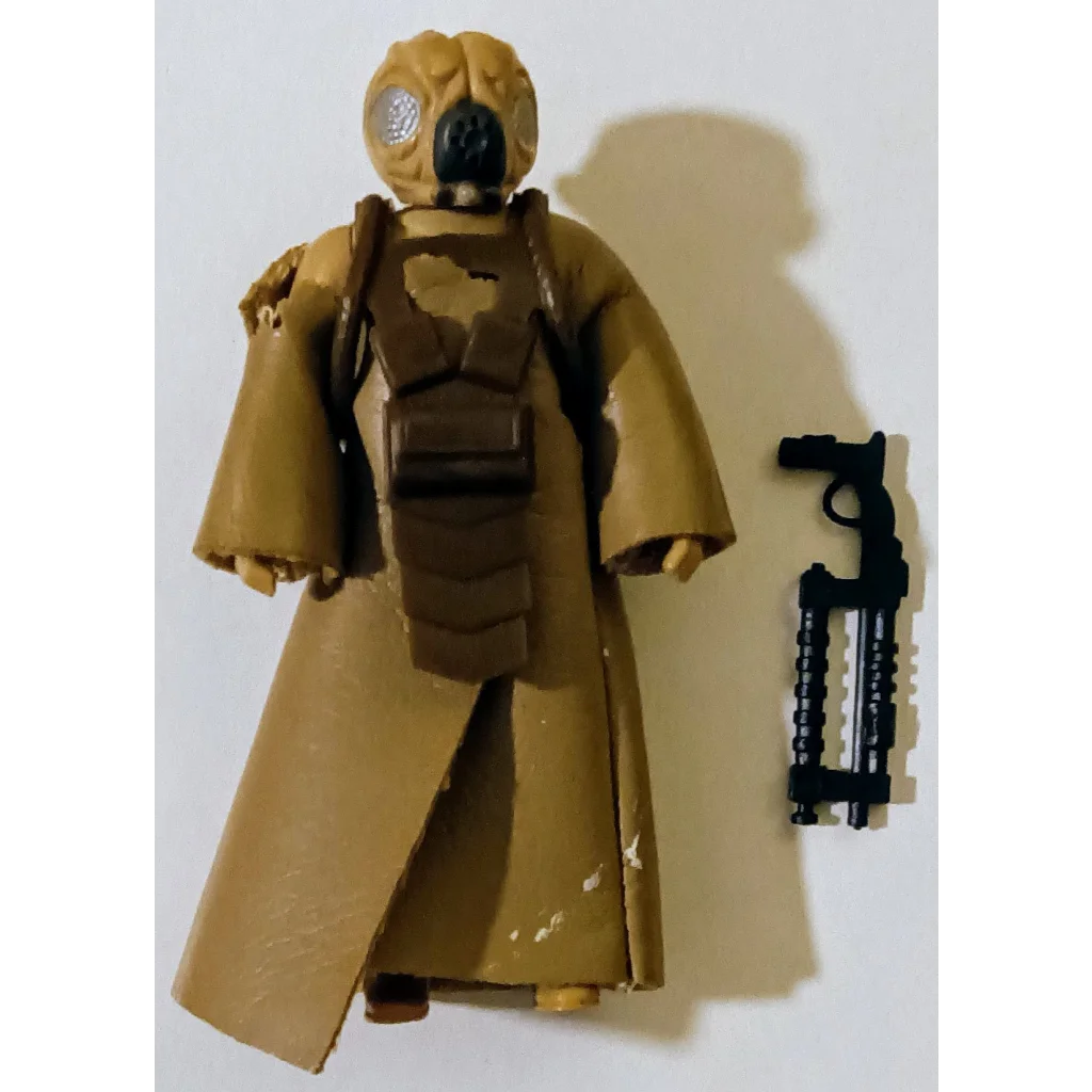 Vintage Star Wars action figure 4-LOM bounty hunter with tan black mask cape gun