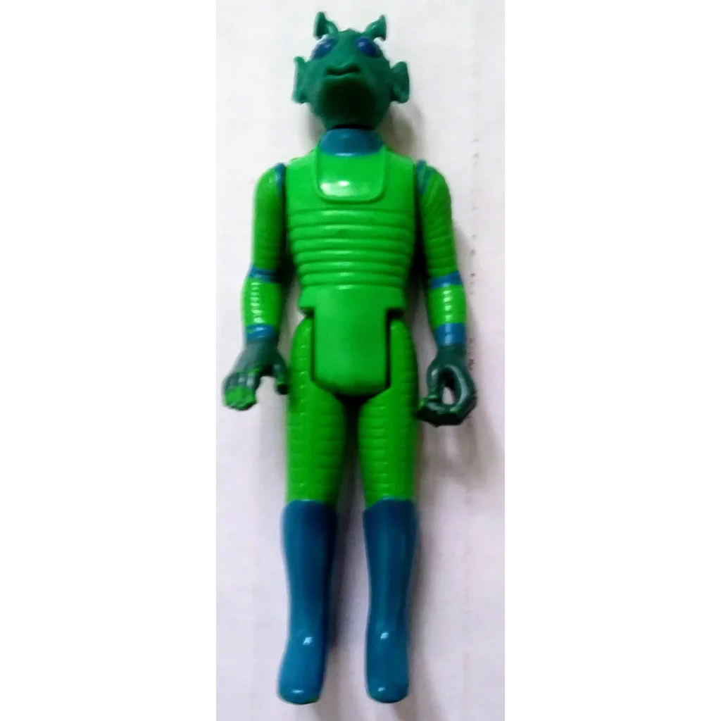 Green and blue Star Wars action figure Greedo bounty hunter with ribbed texture