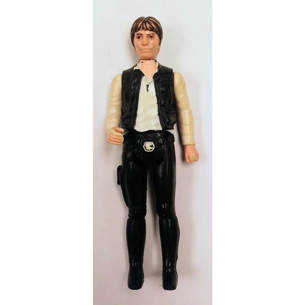 Vintage 1977 Star Wars action figure Han Solo in black vest and pants