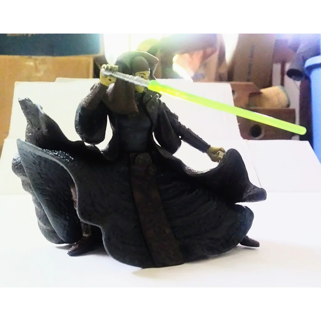 Luminara Unduli Star Wars action figure with green ninja toy and black dragon