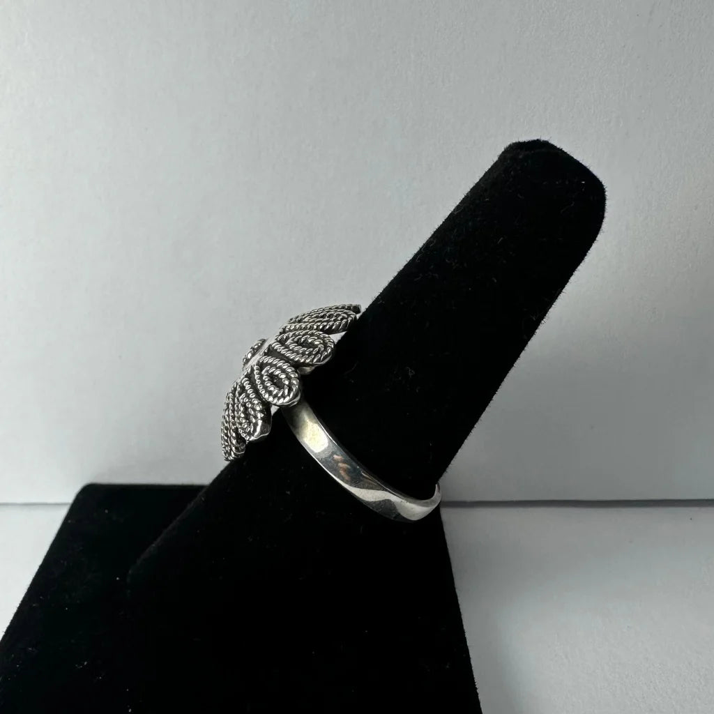 Sterling silver flower ring with twisted filigree petals
