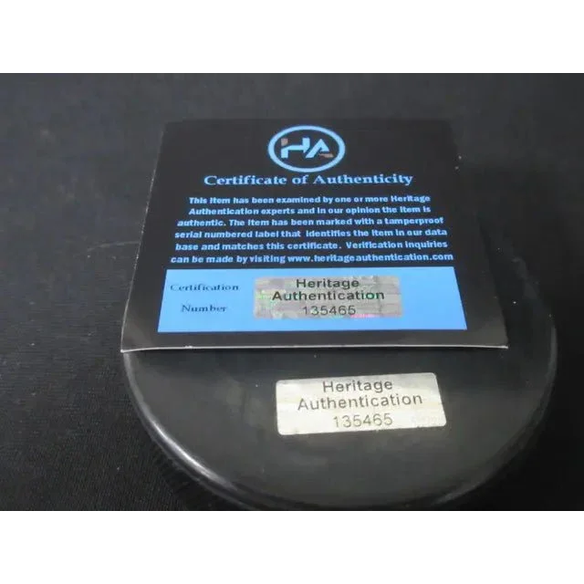 Black Certificate of Authenticity card with silver holographic sticker for Steven Stamkos signed hockey puck