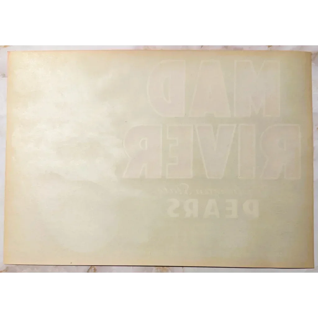 Aged paper with faint text showcasing the stunning 1950s Mad River Pears Label