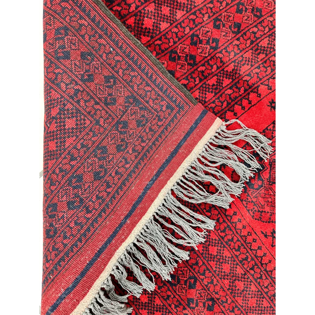 Afghan Ersari hand-knotted rug in deep red tones with blue and black geometric patterns