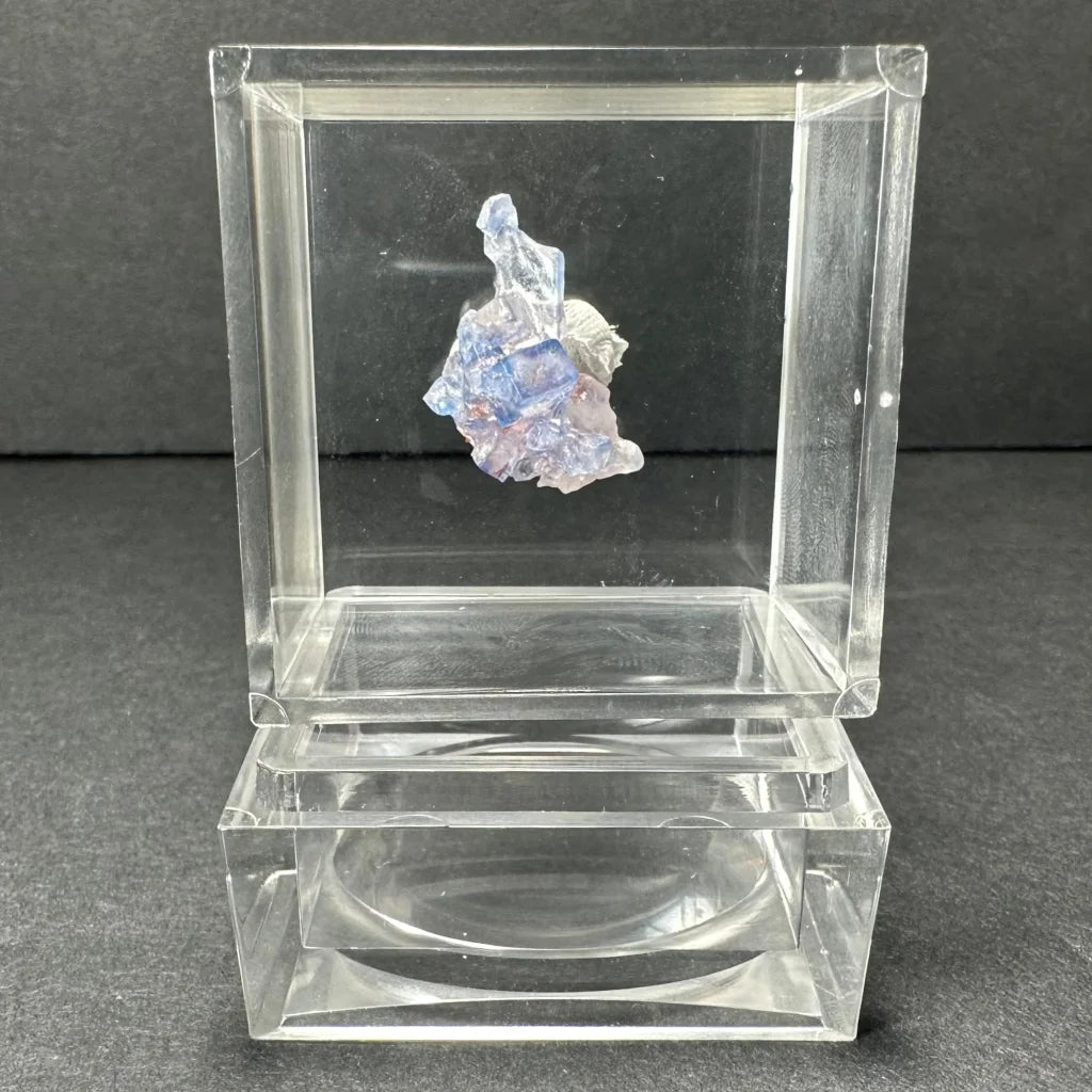 Stunning blue fluorite cube from Minerva Mine in acrylic showcase