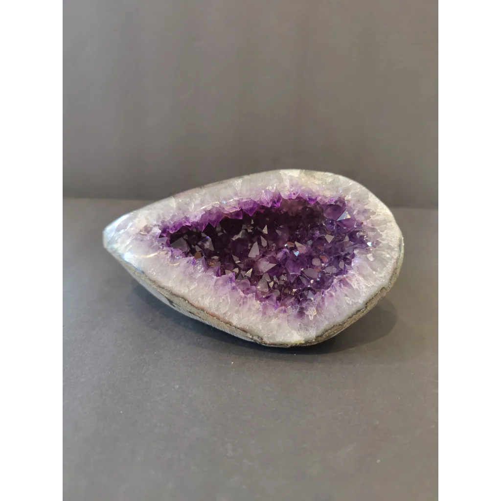 Stunning Brazilian amethyst geode sculpture with purple crystal core