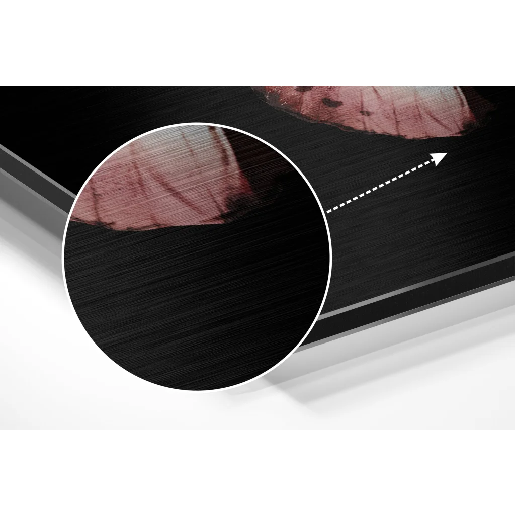 Black leather laptop sleeve with red stitching on brushed aluminium dibond art