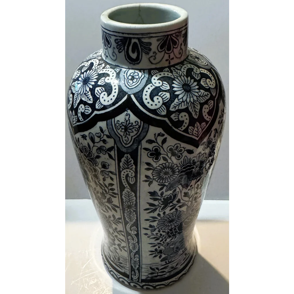 Black and white floral Delft blue vase from early 1900s Delftware collection