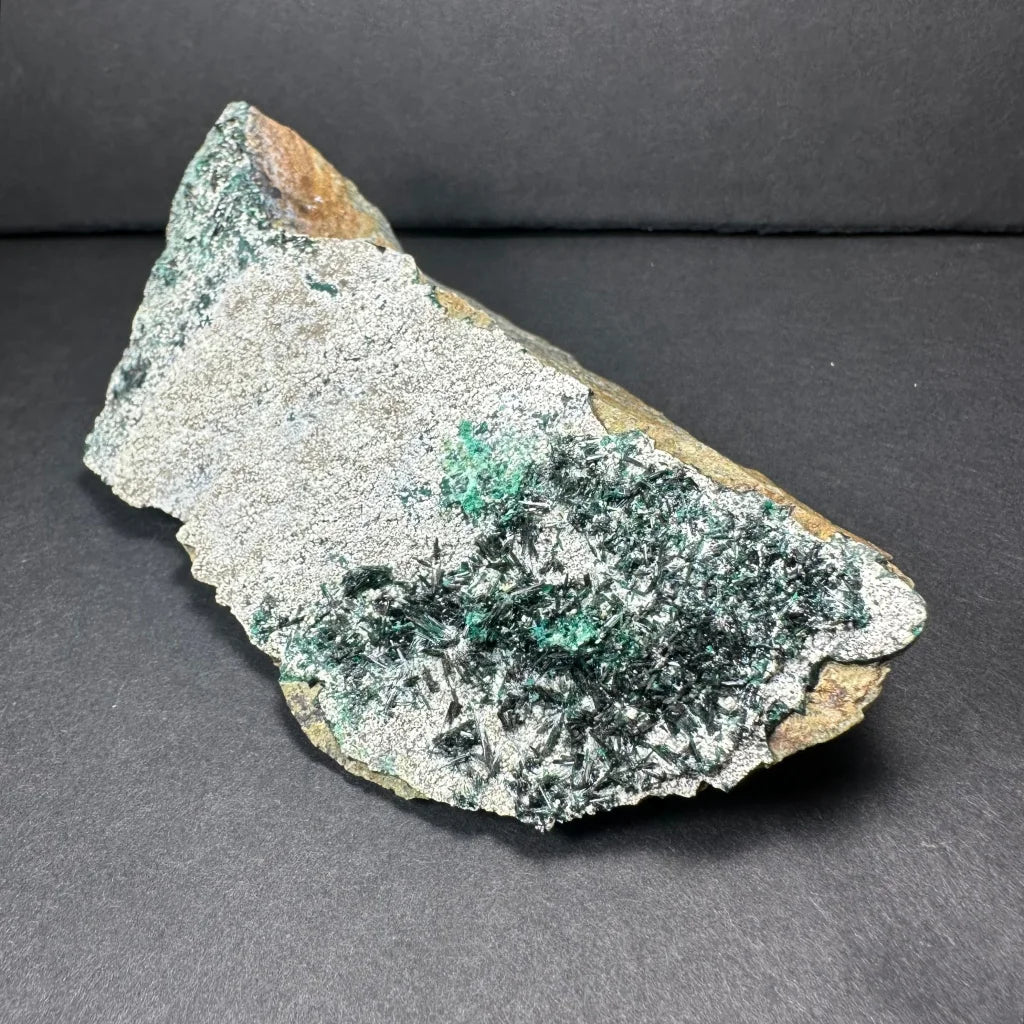 Stunning green epidote crystal clusters on natural matrix