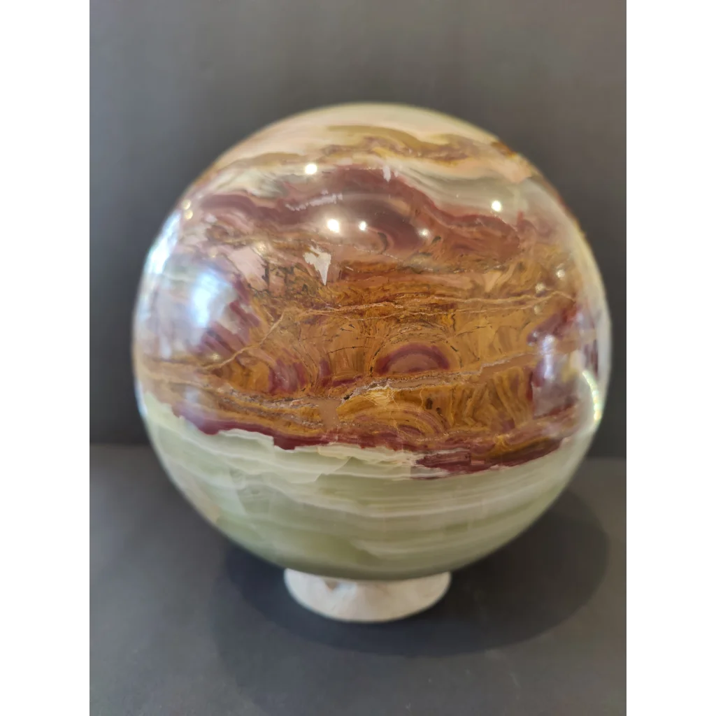 Stunning green onyx sphere with onyx display stand from Pakistan