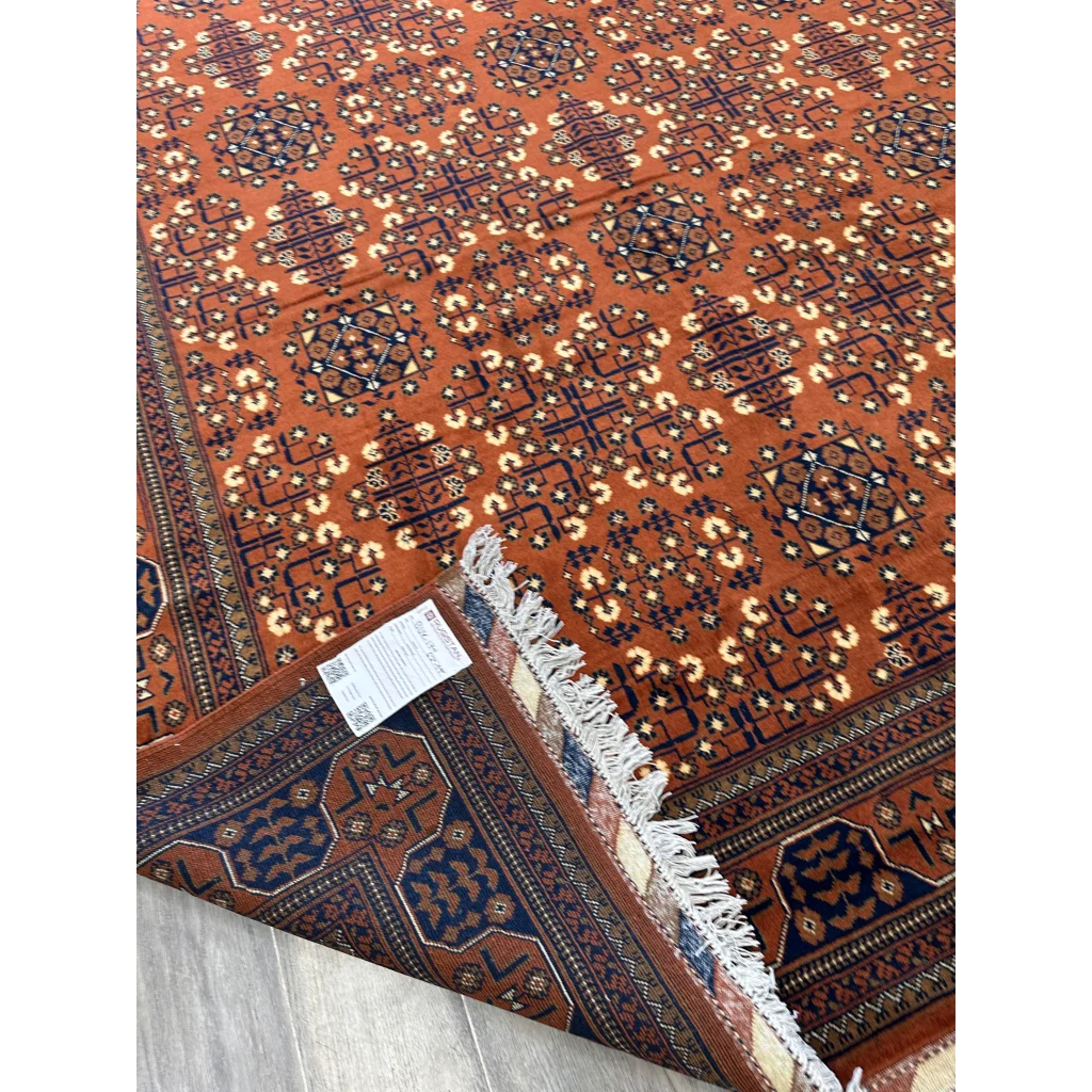 Stunning hand-knotted Afghani Bukharayi rug in orange, navy, and cream patterns