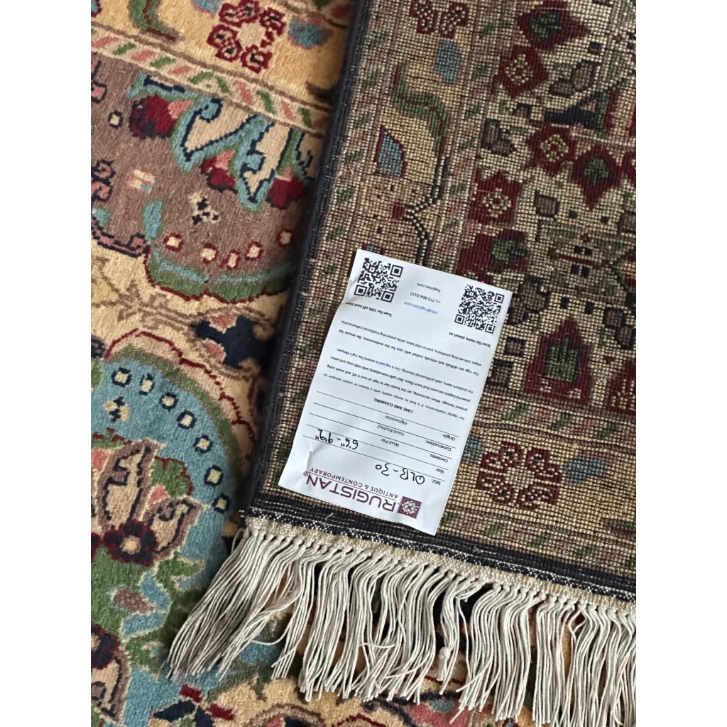 Heart shape afghan rug on cotton foundation with floral patterns