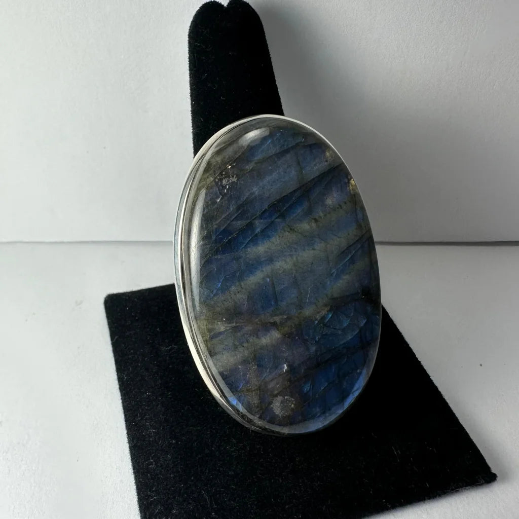 Sleek sterling silver labradorite ring with oval blue flash stone