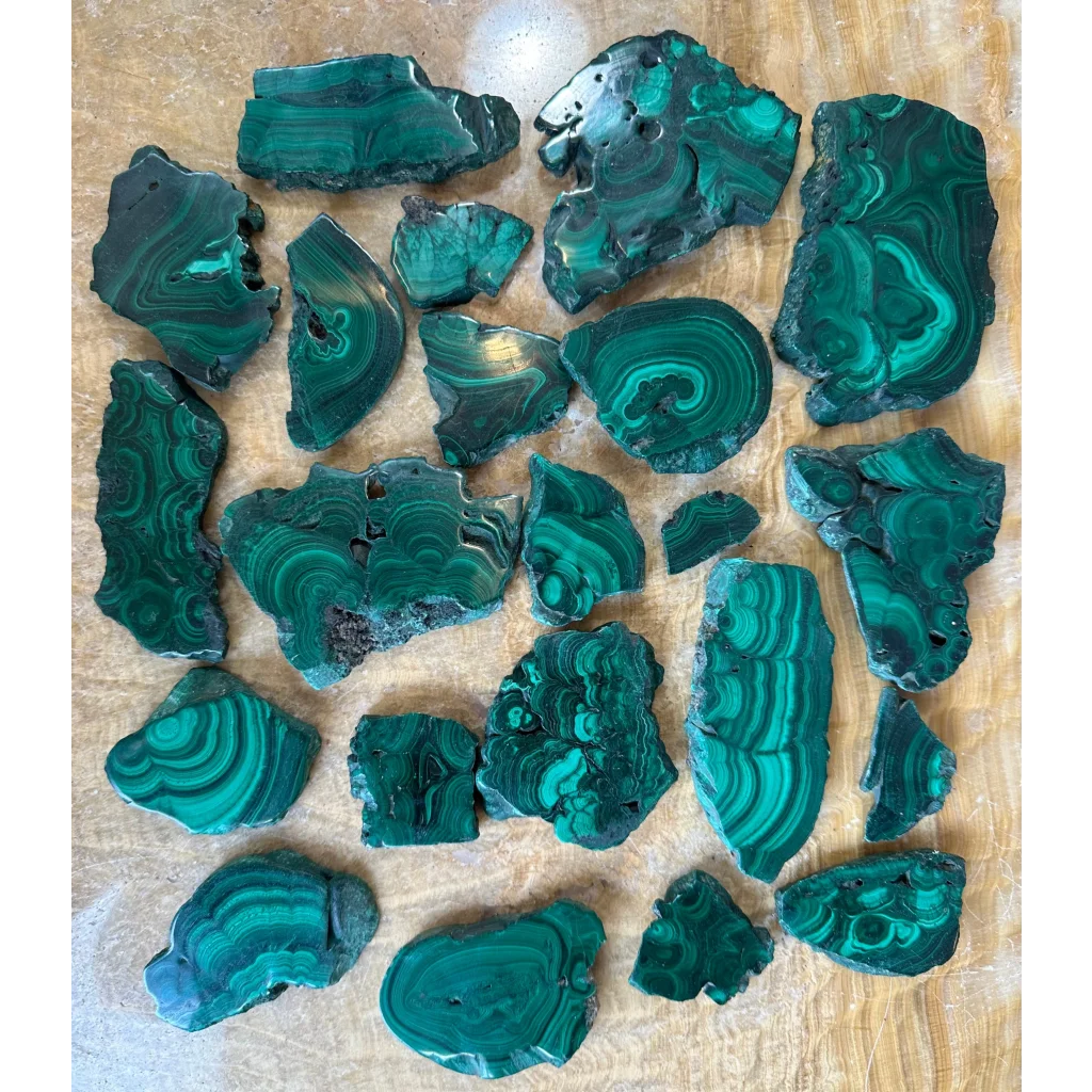 Vibrant green malachite slice from Congo with mesmerizing bands