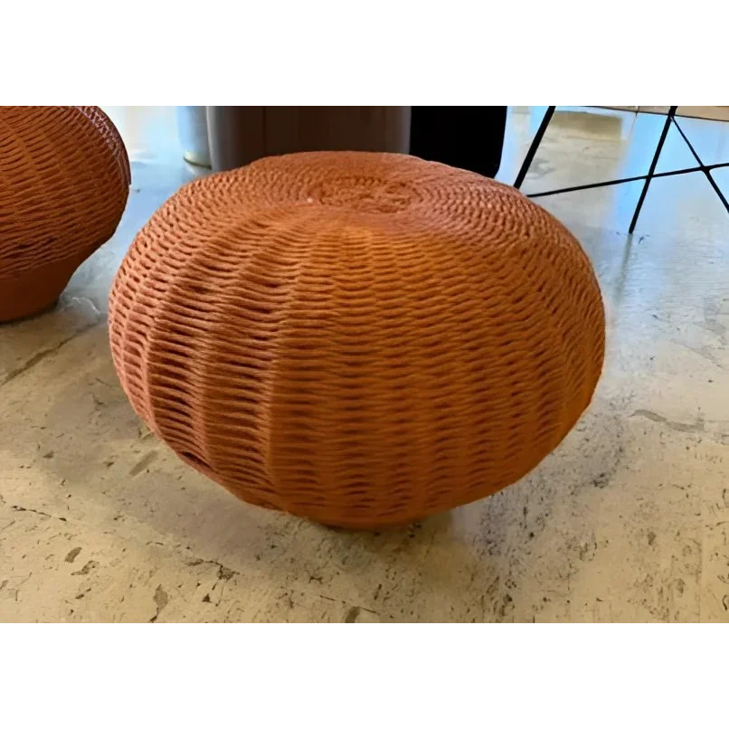 Round woven wicker ottoman with nautical cord design from Roberta Schilling Rosenbaum stool
