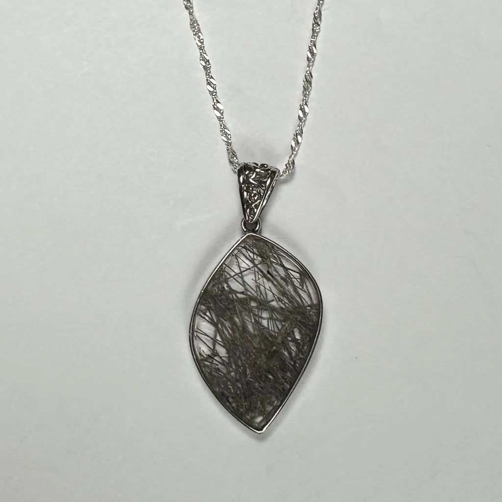 Stunning silver filigree rutilated quartz teardrop pendant