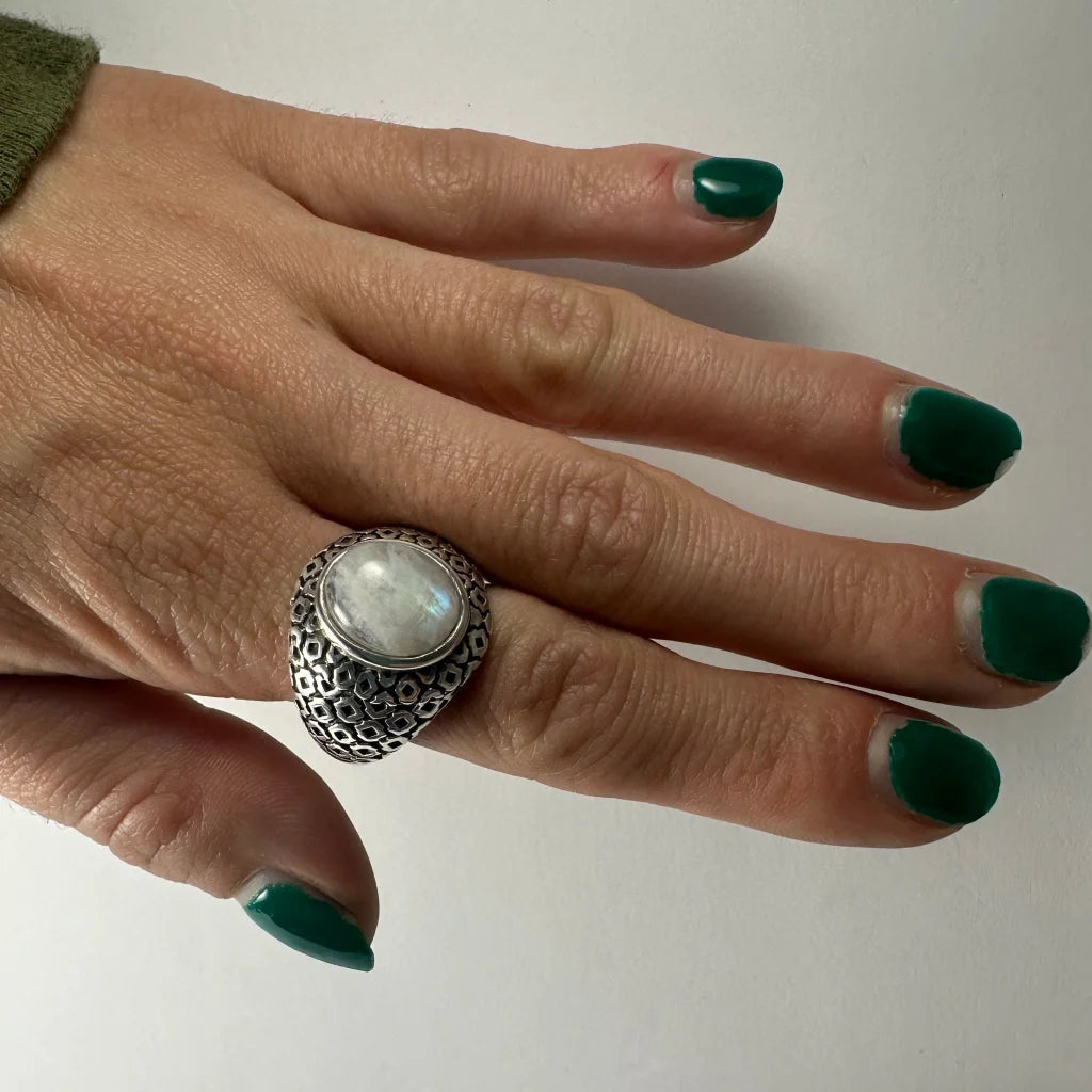 Stunning silver moonstone ring with oval gem and geometric band