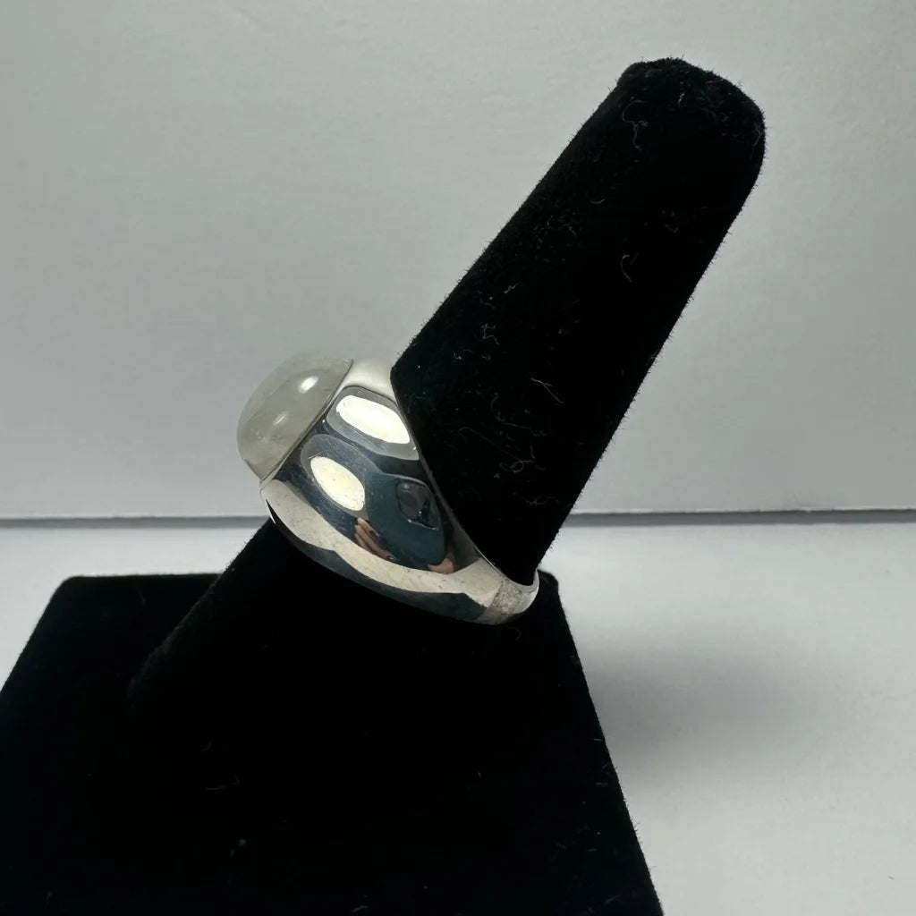 Sleek silver moonstone ring with iridescent glow