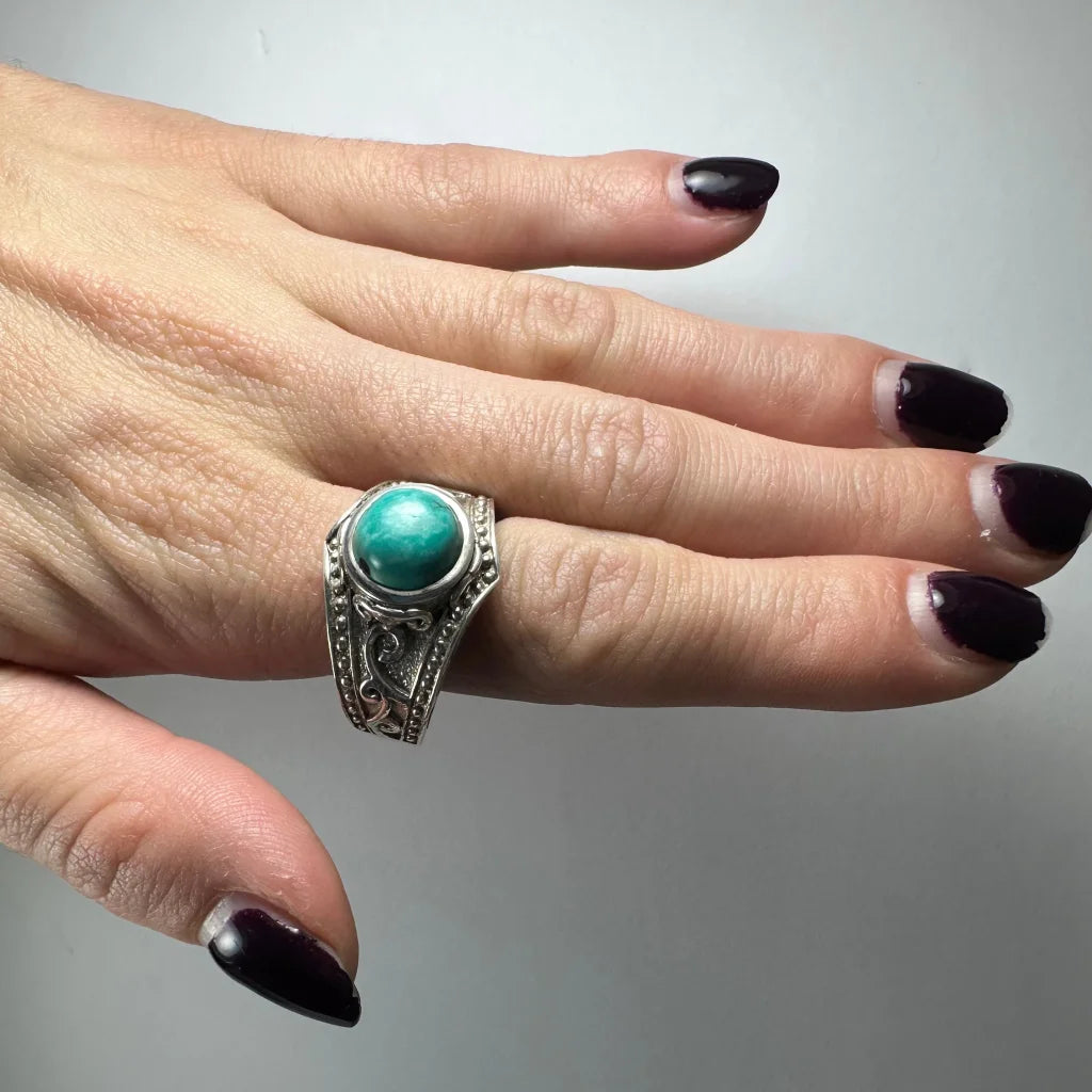 Stunning silver turquoise ring with ornate filigree and beaded design