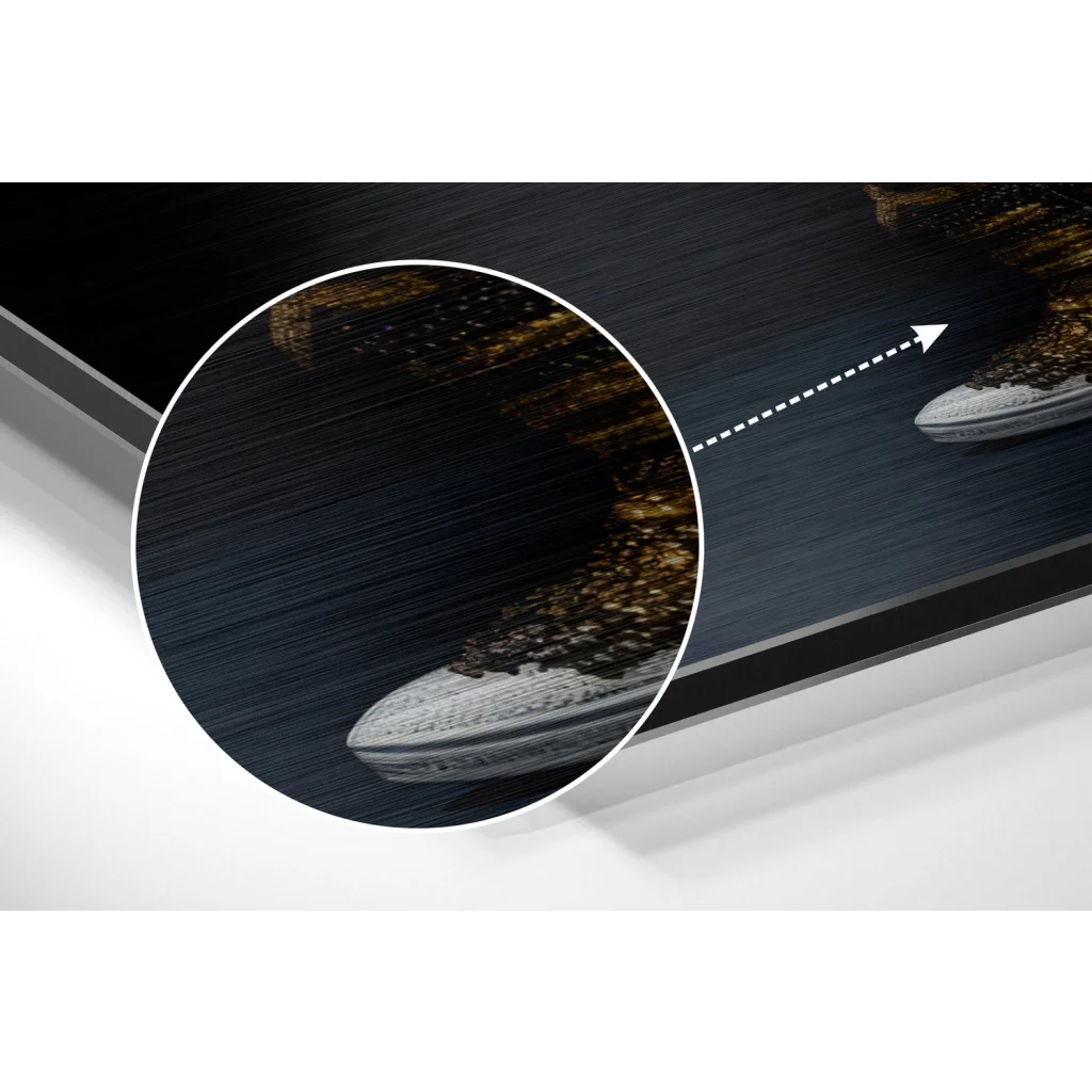 Sleek white sneaker with gold accents on brushed aluminium dibond print