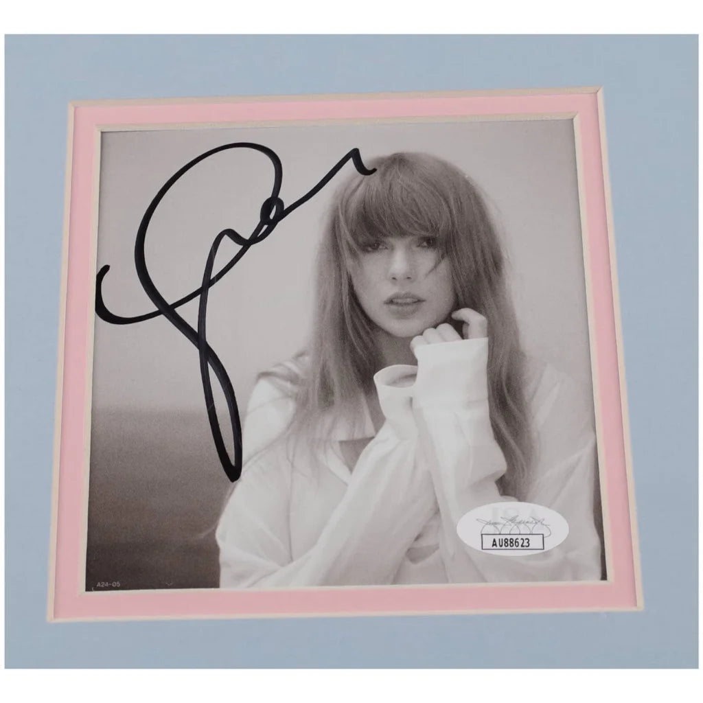 Framed autographed Taylor Swift photo, deluxe 11x14 black-and-white signed image