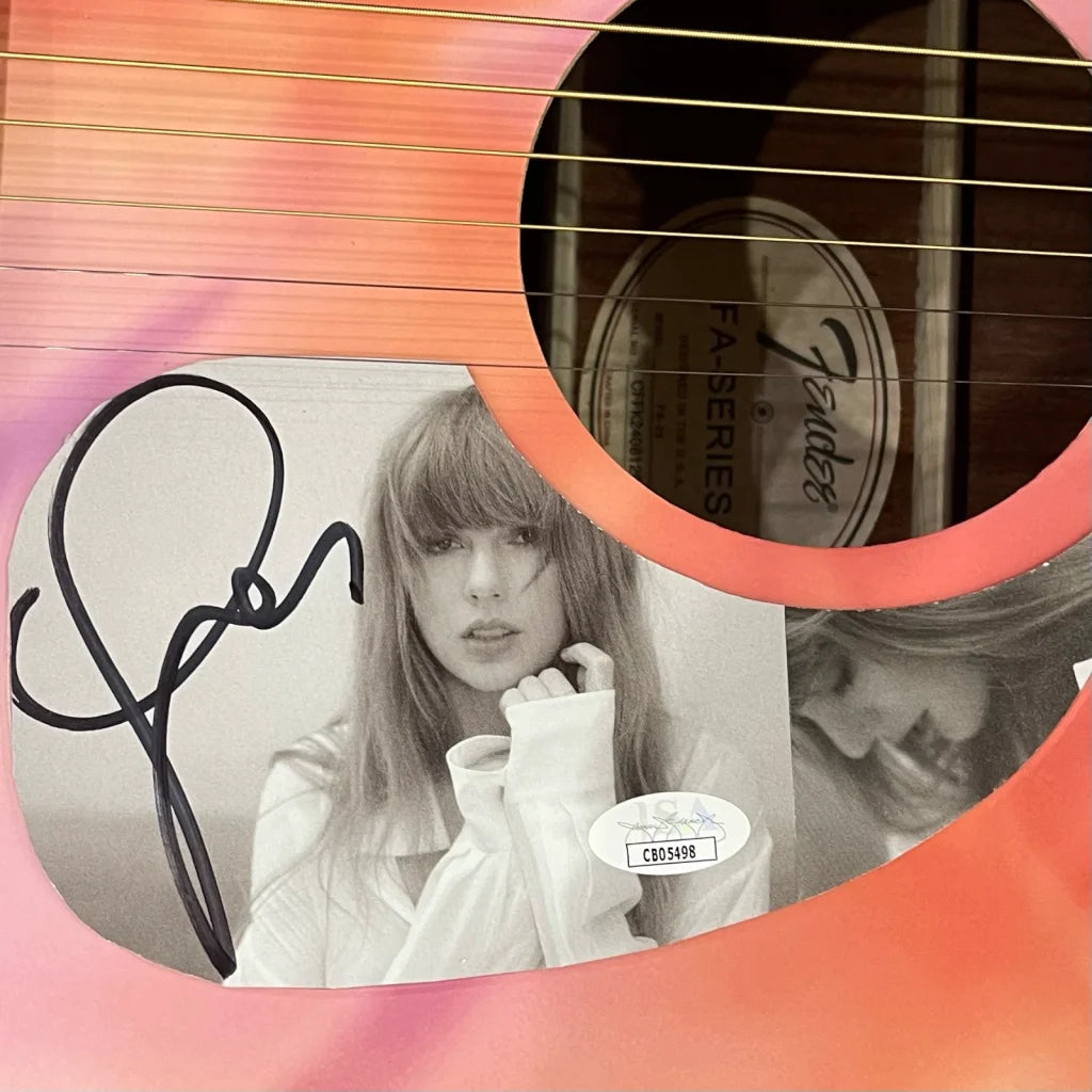 Signed black-and-white Taylor Swift photo with Eras Tour guitar