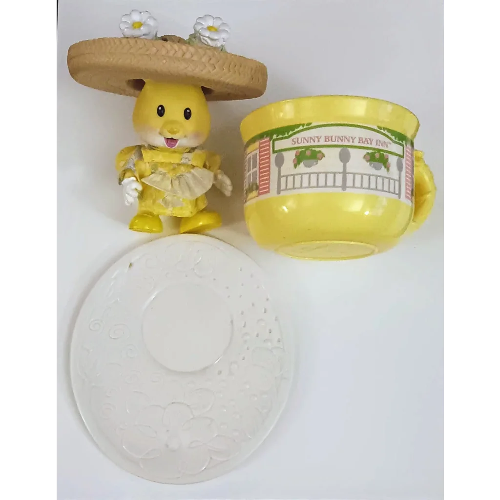 Vintage 1990s yellow tea bunnies doll with daisy hat and dress