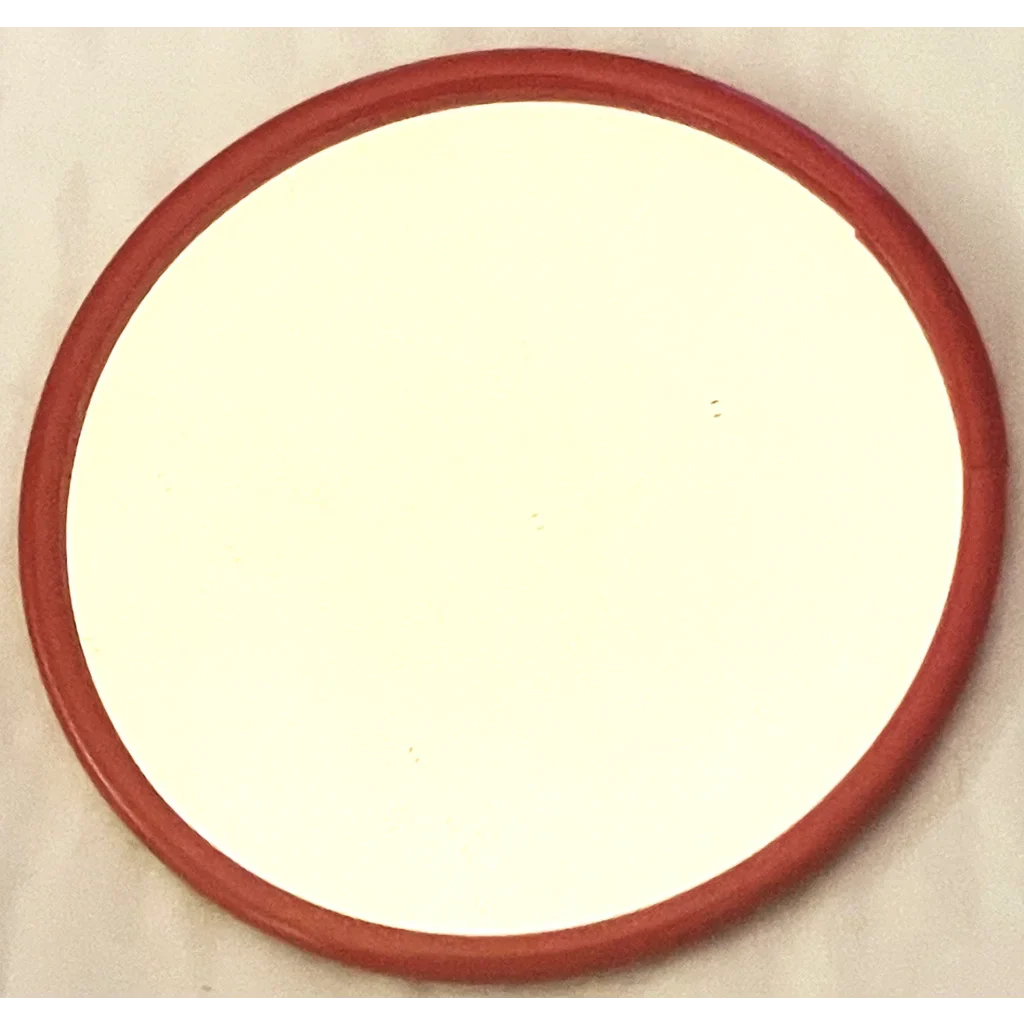 Circular mirror with a red frame, perfect vintage memorabilia or antique gift