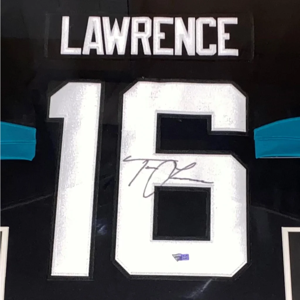 Autographed Trevor Lawrence black and white deluxe framed jersey number 16