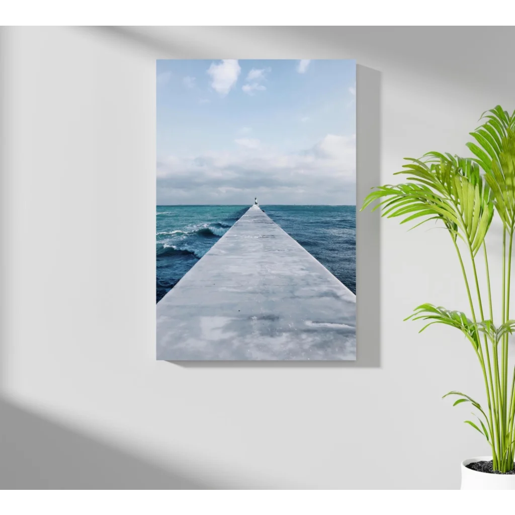 Gray pier extending into turquoise ocean on canvas print