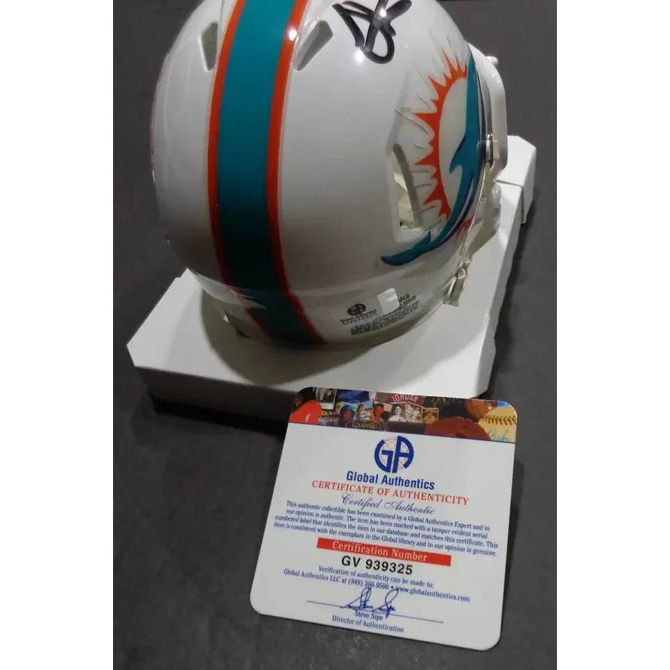 White Miami Dolphins helmet signed by Tyreek Hill with COA, perfect for Miami Dolphins fans